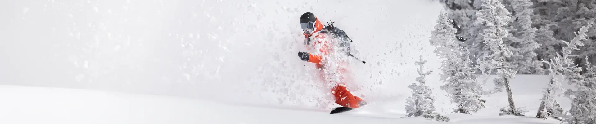 Man snowboarding in deep snow